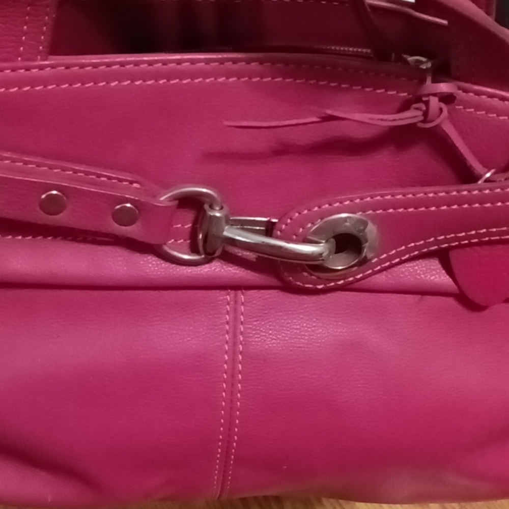 Pretty in pink leather handbag with orange lining  13 " across x 8 " long